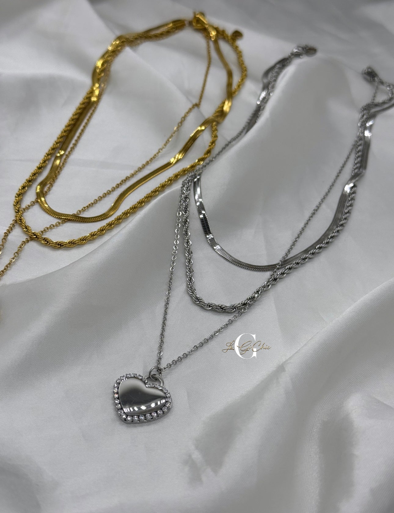 Collana “Snake, funetta e cuore zirconato”