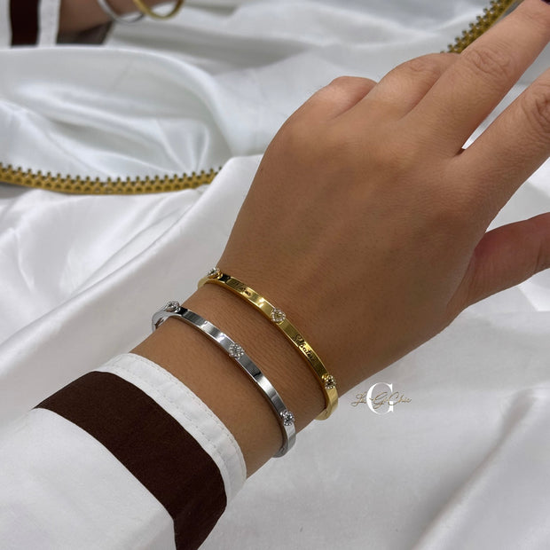 Bracciale “rigido con 3 cuori”